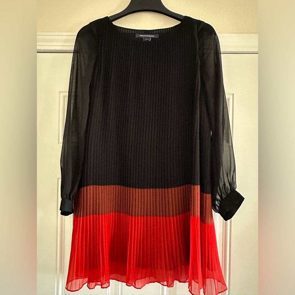 Mini dress with sheer long sleeves